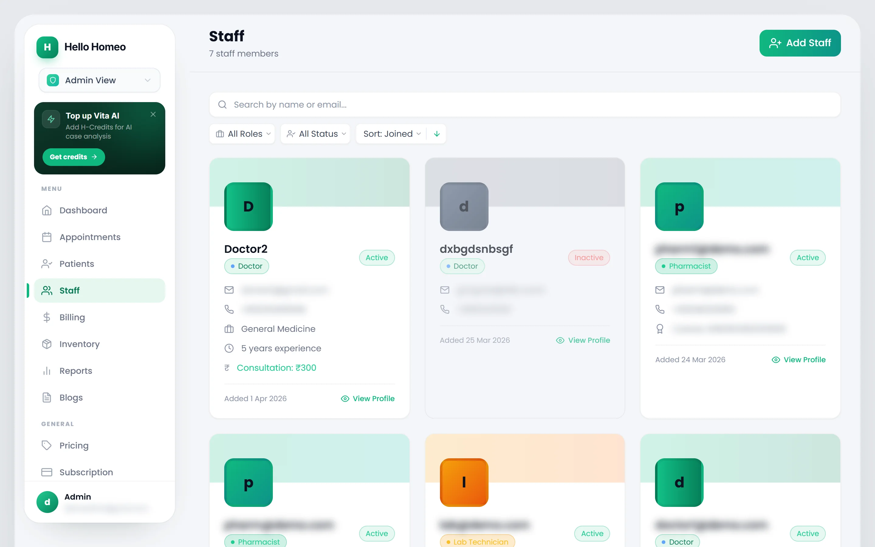 The Staff screen showing staff cards with role and status pills